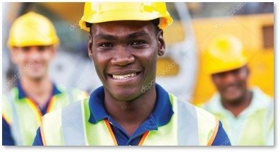 Construction professional reviewing blueprints